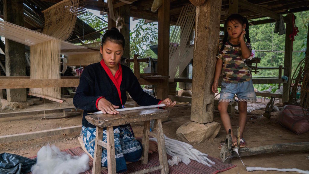 RADAR_Laos_NYT_Villagers who provide thread to Lao Textiles in Vientiane spin cotton in Nam Bak Laos Credit Adam Dean for The New York Times